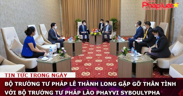 Bộ trưởng Tư pháp Lê Thành Long gặp gỡ thân tình với Bộ trưởng Tư pháp Lào Phayvi SYBOULYPHA