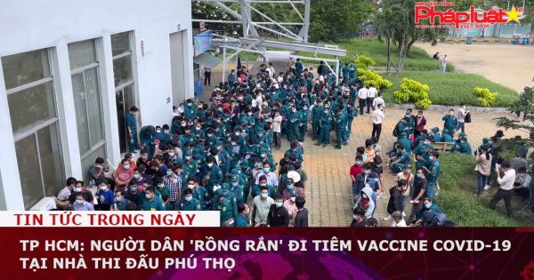TP HCM: Người dân 'rồng rắn' đi tiêm vaccine COVID-19 tại nhà thi đấu Phú Thọ